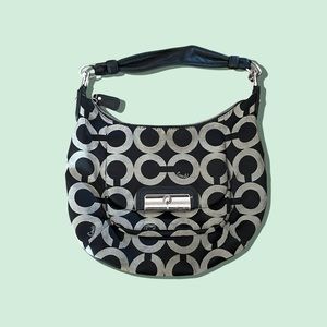 Coach purse logo and front pocket